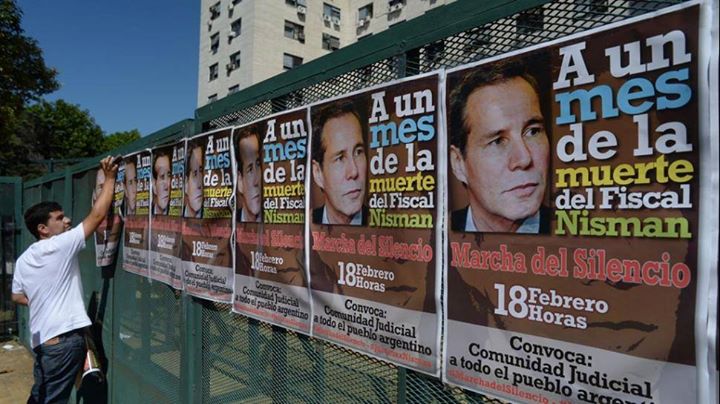 Posters advertise protest march in Argentina.