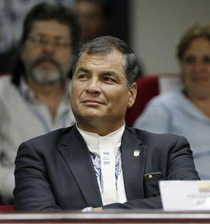 An angry Rafael Correa listens to U.S. President Barack Obama at the Summit of the Americas.
