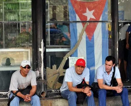 Cubans waiting outside an immigration office in Quito