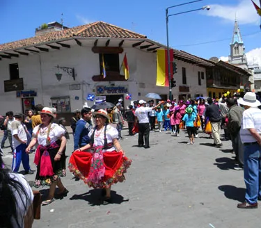 Ecuadorians know how to have fun: Dancers on Calle Simon Bolivar.