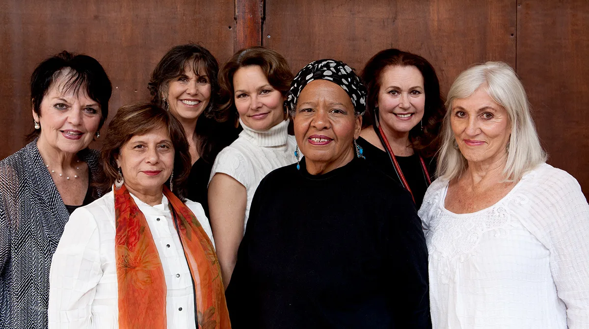The expat Seven Cast: from left to right, back row: Deana Culp, Marsea Hart, Laura Inks Bodine, Elinor Williams; front row: Reshma Ruzicke, Egyirba High, and Linda Walker