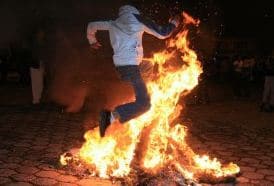 Cuenca rings in New Year with fire and satire