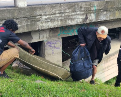 Autopsies show Guayaquil boys were shot before their bodies were burned; Cuenca homeless camps are dismantled; More rain predicted; Expat arrested