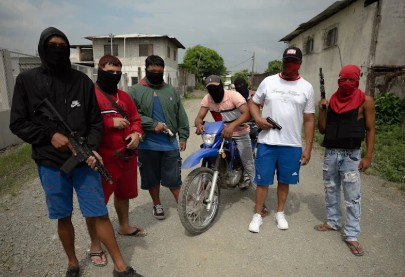 On the front line of Ecuador’s drugs war, police fight gangs, guns and government corruption